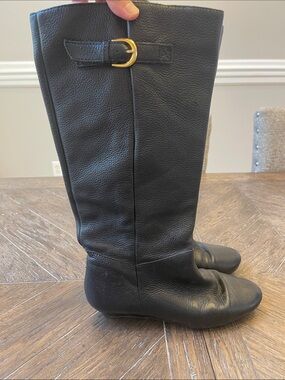 Steve Madden Black Leather Knee-High Boots with Gold Buckle Accent